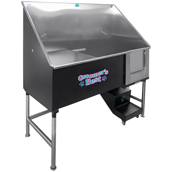 A black Groomer's Best pet grooming tub with a stainless steel drainboard.