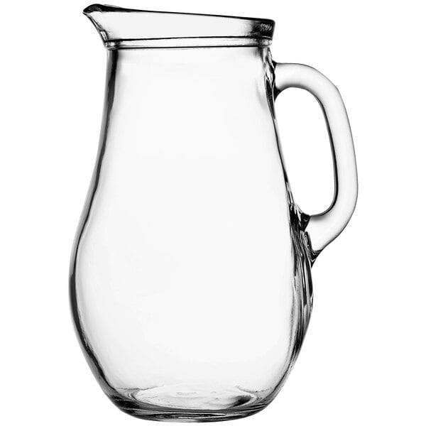 A Pasabahce clear glass pitcher with a handle.
