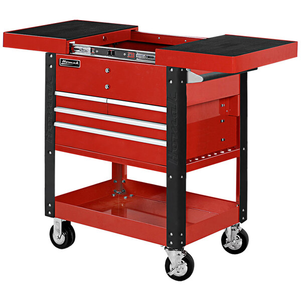 A red Homak Pro Series tool cart with black trim and a black slide top on black wheels.