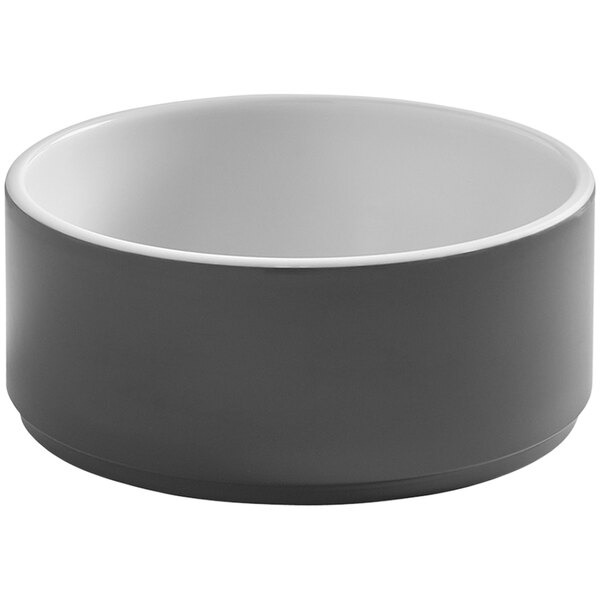 A grey bowl with a white rim.