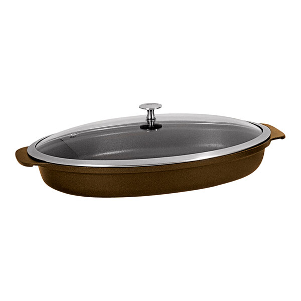 A Spring USA bronze non-stick shallow oval roaster with a lid.