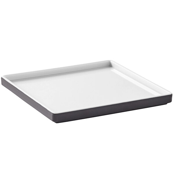 An American Metalcraft white square plate with a black border.