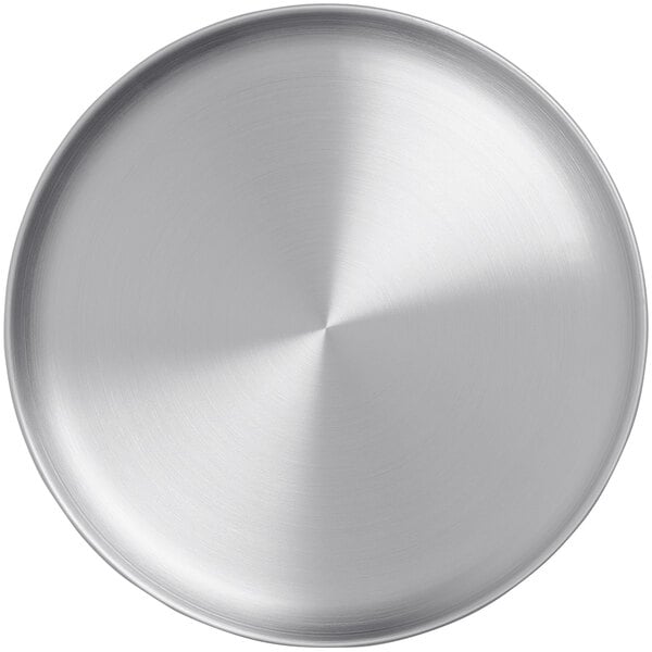 An American Metalcraft satin stainless steel plate with a circular texture.