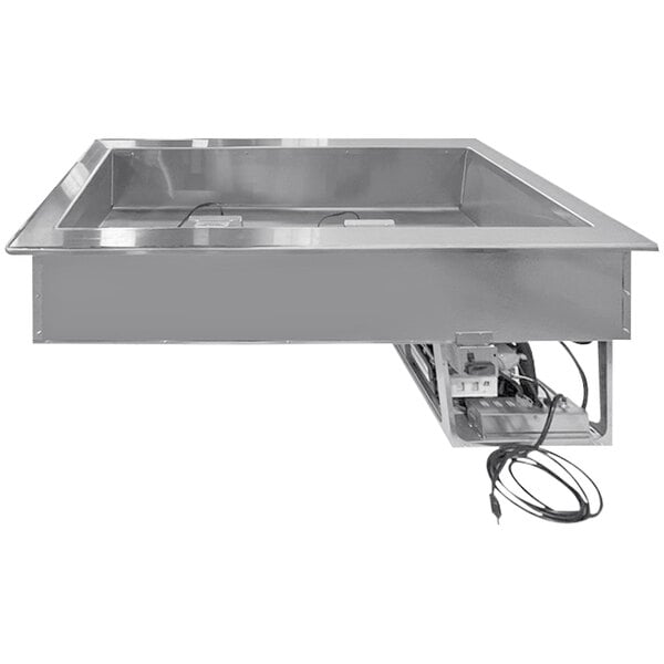 A LTI stainless steel drop-in refrigerated well with pans in a counter.