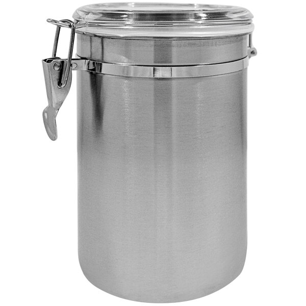 A Spring USA stainless steel canister with a clear lid and metal handle.