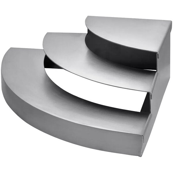 A metal display riser with three curved steps.
