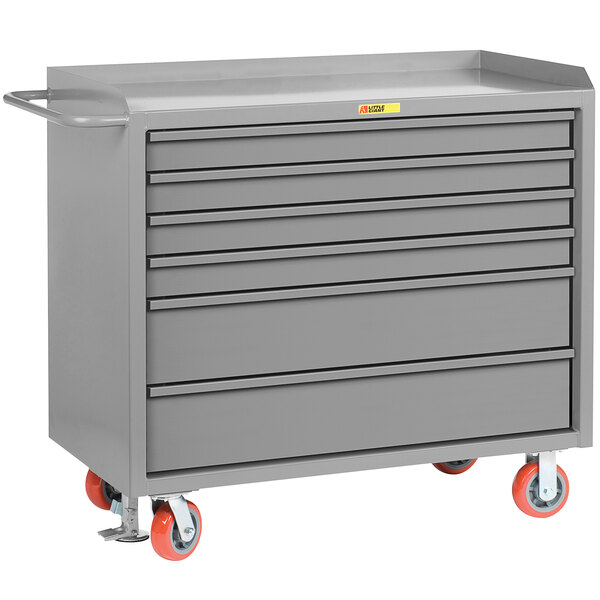 A Little Giant gray metal mobile tool cabinet with red wheels.