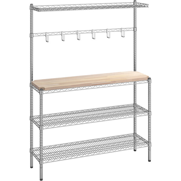 A metal shelf with two wire shelves and a wood top.