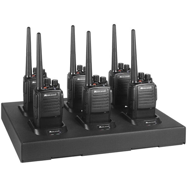 A group of six Midland BizTalk walkie talkie radios on a stand.