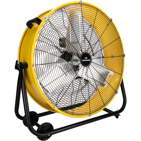 A yellow and black Tornado high-velocity drum fan on wheels.
