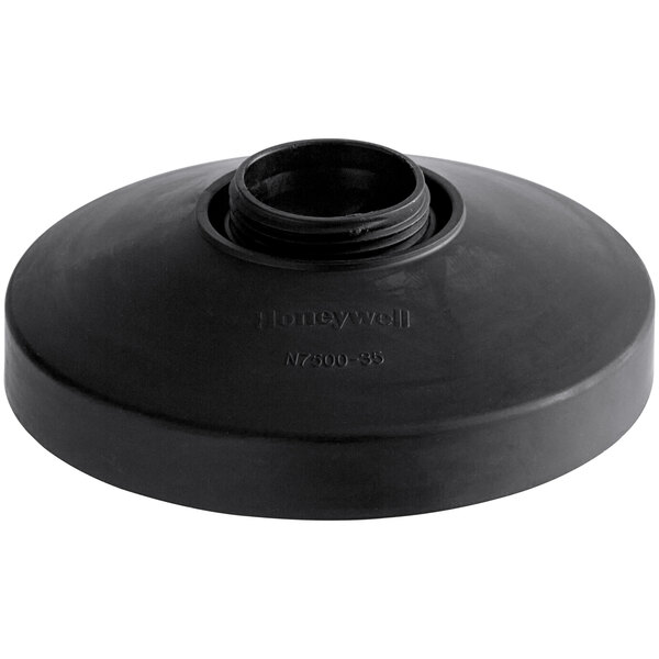 A black plastic lid with a hole in it.