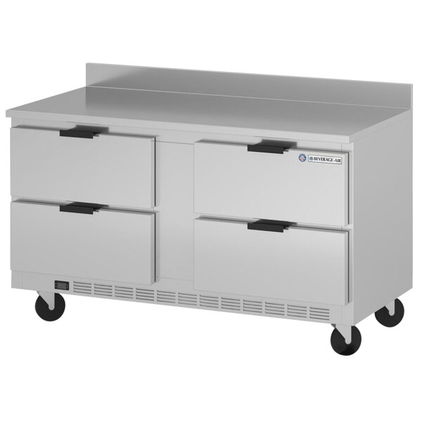 A large silver Beverage-Air worktop freezer with four drawers on wheels.