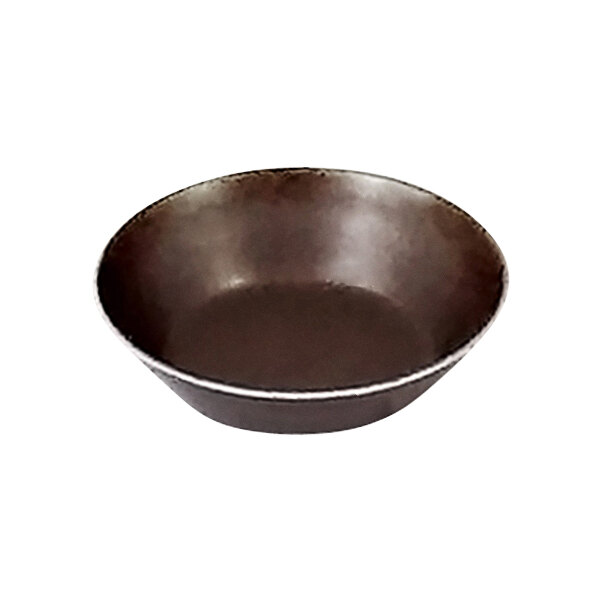 A brown non-stick Gobel tartlet pan.