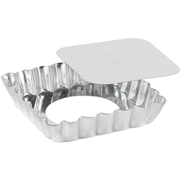 A silver Gobel square tartlet pan with a removable bottom.
