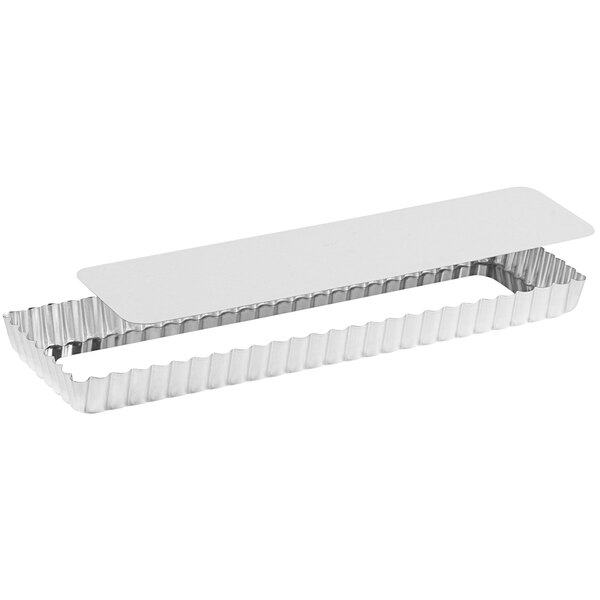 A silver rectangular tin with a rectangular edge and a white strip.