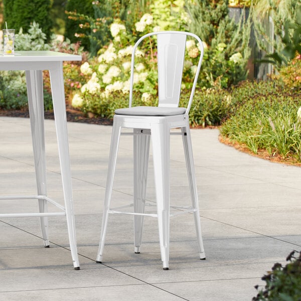 Lancaster Table & Seating Alloy Series White Outdoor Cafe Barstool with Gray Fabric Magnetic Cushion