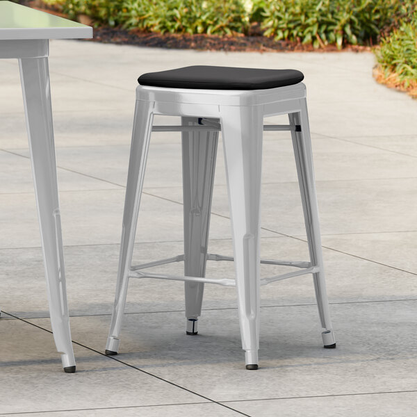 Lancaster Table & Seating Alloy Series Silver Outdoor Backless Counter Height Stool with Black Fabric Magnetic Cushion