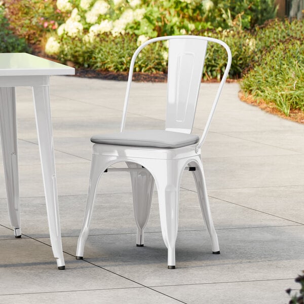 Lancaster Table & Seating Alloy Series White Outdoor Cafe Chair with Gray Fabric Magnetic Cushion