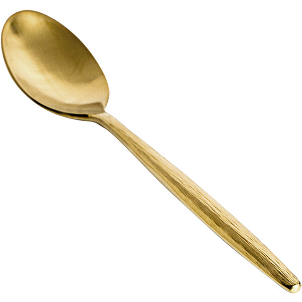 The front of a matte brass Owen dinner/dessert spoon with a wooden handle.