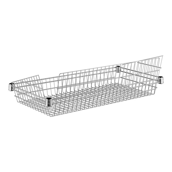 A Regency chrome wire basket with a wire handle.