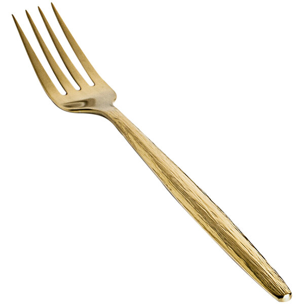 A close-up of the front of a Front of the House Owen stainless steel dinner fork with a matte brass handle.
