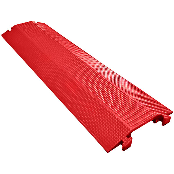 A red plastic rectangular surface with holes in it.