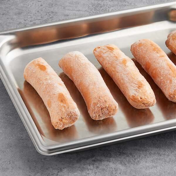 A tray of Beyond Meat Plant-Based Hot Italian Sausages on a gray surface.