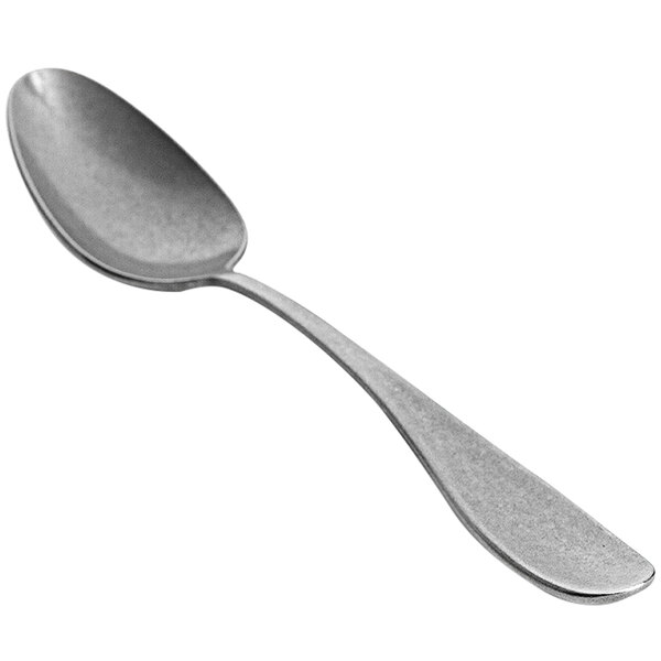 A Front of the House Cameron stainless steel spoon with an antique silver handle.