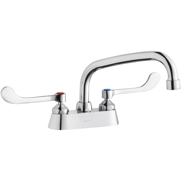 A silver Elkay deck-mount faucet with two wristblade handles and an arc tube swing spout.