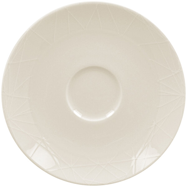 A RAK Porcelain Wonder ivory porcelain saucer with a circular edge.