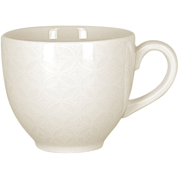 A RAK Porcelain ivory porcelain cup with an embossed pattern and handle.