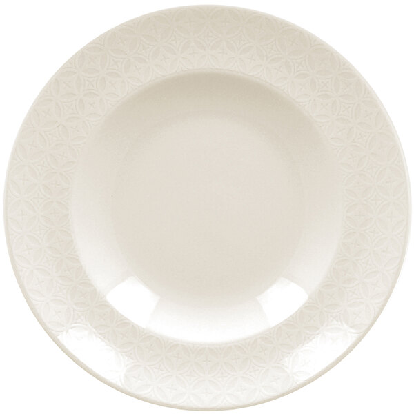 A close up of a RAK Porcelain ivory deep plate with a lace pattern.
