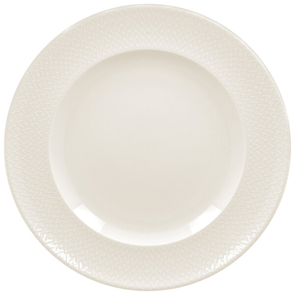 A white RAK Porcelain flat plate with a zigzag pattern.