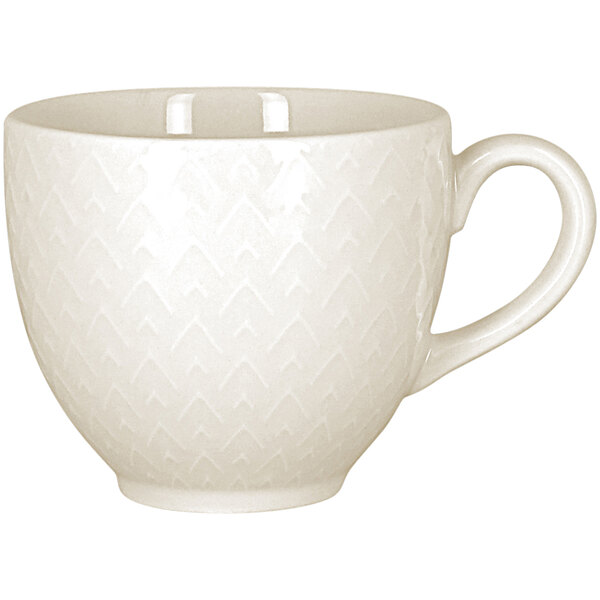 A RAK Porcelain ivory cup with an embossed pattern and a handle.