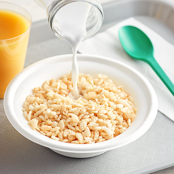 A bowl of Kellogg's Rice Krispies cereal with milk and a spoon.