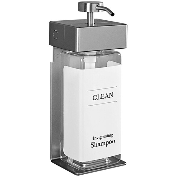 A white ABS plastic wall-mounted shower dispenser with a clear rectangular bottle inside.
