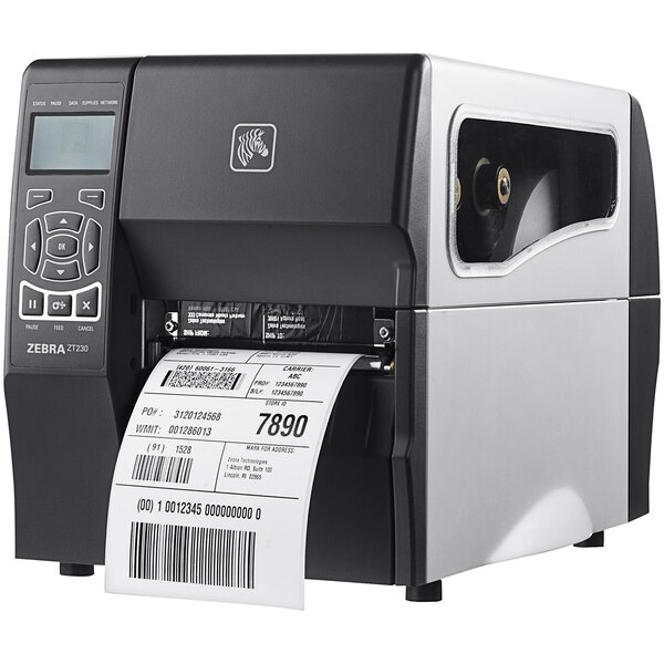 A black and silver Zebra ZT230 label printer.
