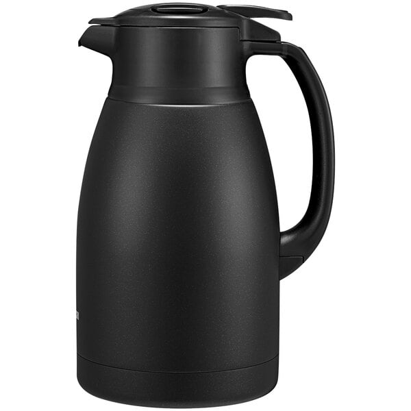 A Zojirushi matte black stainless steel coffee carafe with a handle and lid.