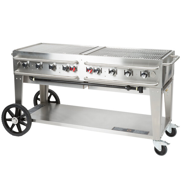 A large stainless steel Crown Verity outdoor rental grill with wheels.