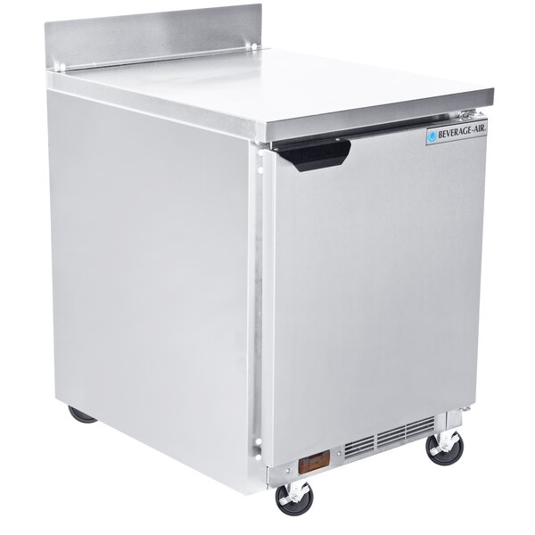 A silver Beverage-Air worktop freezer on wheels.