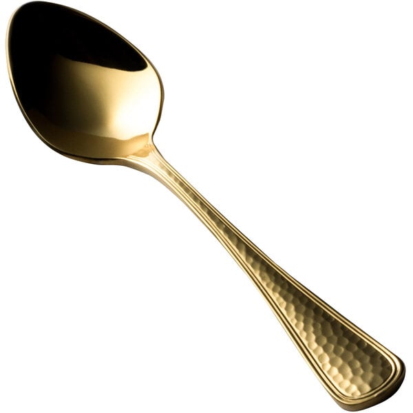 A Bon Chef gold demitasse spoon with a handle and a spoon end.