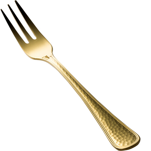 A close-up of the handle of a gold Bon Chef cocktail/oyster fork.