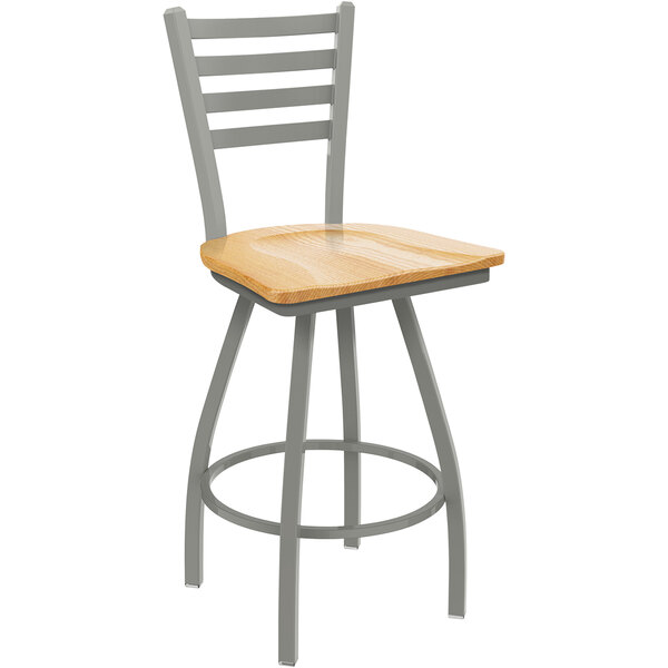 A Holland Bar Stool Jackie Ladderback Bar Stool with a natural oak seat and an anodized nickel finish.
