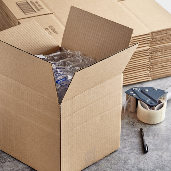 A Kraft corrugated shipping box with multiple boxes inside.