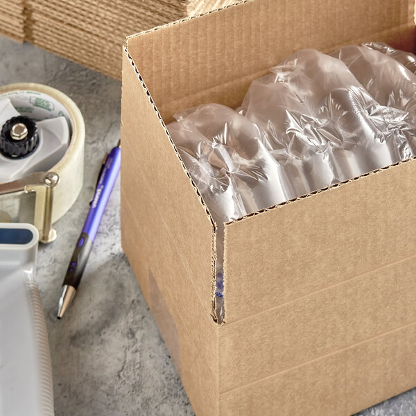 A Lavex cardboard shipping box with plastic bottles inside.