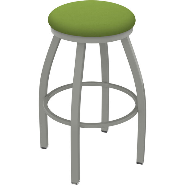 A Holland Bar Stool with an anodized nickel frame and a kiwi green seat.