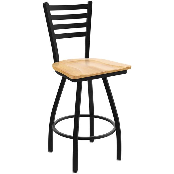 A black bar stool with a natural maple wooden seat.
