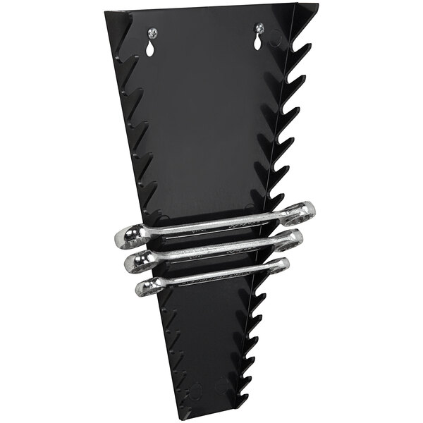 A black metal Quantum wrench holder with silver screws holding two wrenches.