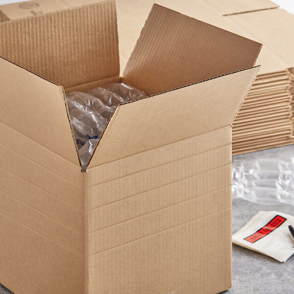 A Lavex cardboard shipping box with a clear plastic wrap inside.