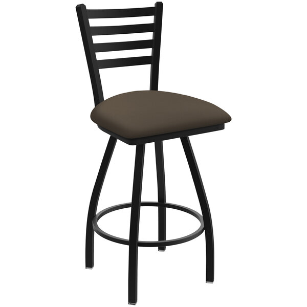 A black restaurant bar stool with a brown seat.